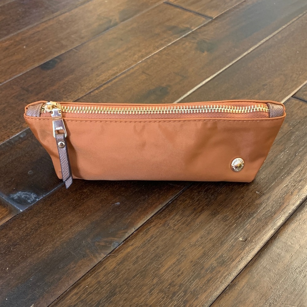 Mango Orange Pouch with Brown pull and gold hardware Like New